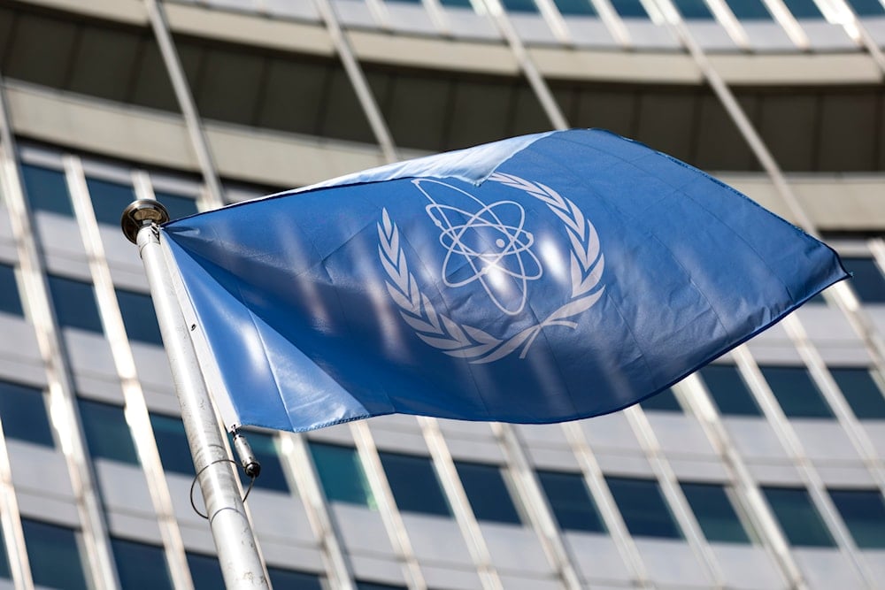 In this June 7, 2021, file photo, the flag of the International Atomic Energy Agency (IAEA) waves at the entrance of the Vienna International Center in Vienna. (AP)