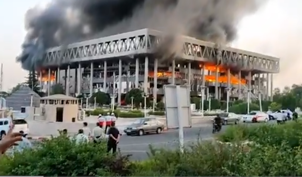 An IRIB correspondent reporting live after the broadcaster's headquarters were struck by Israeli airstrikes, Tehran, June 16, 2025 (Screengrab)