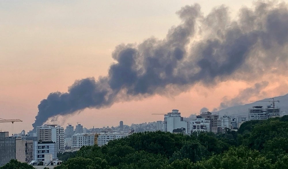 Smoke rises from the building of Iran's state-run television after an Israeli strike in Tehran, Iran, Monday, June 16, 2025. (AP)