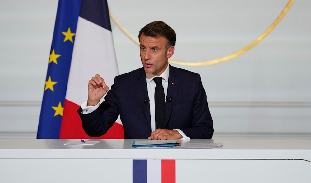 French President Emmanuel Macron holds a news conference at the Elysee Palace, in Paris, Friday, June 13, 2025. (AP)