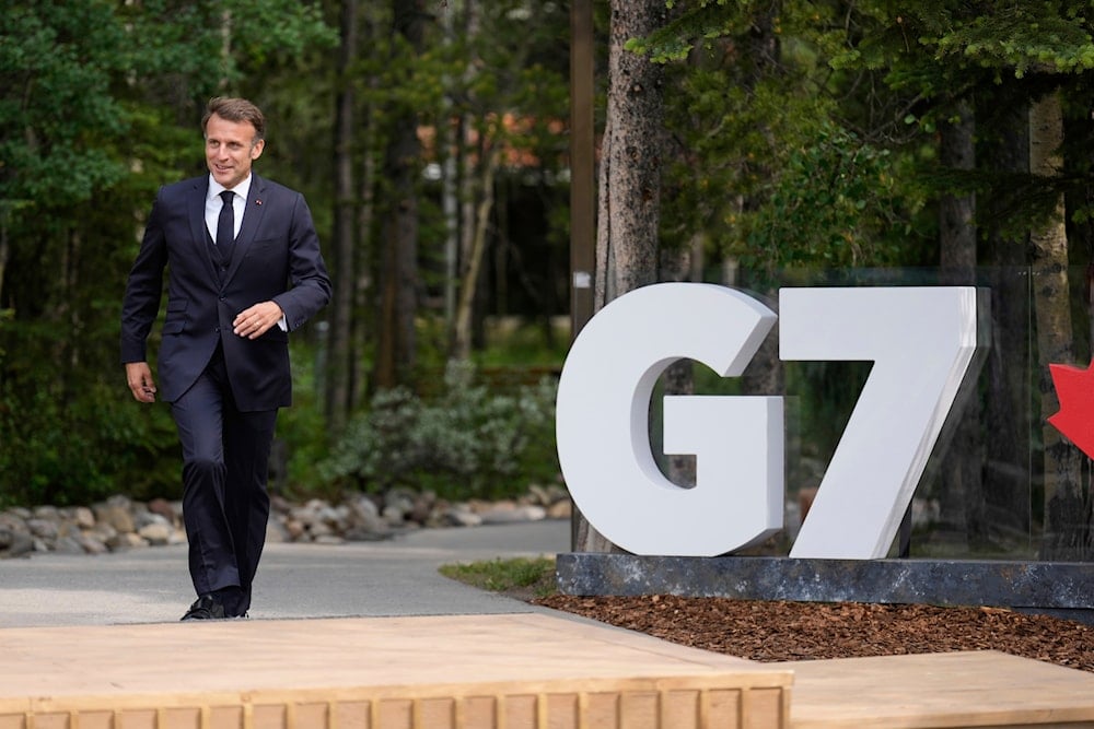 France's President Emmanuel Macron arrives during the official welcome of the G7 Summit, Monday, June 16, 2025, in Kananaskis, Canada. (AP)