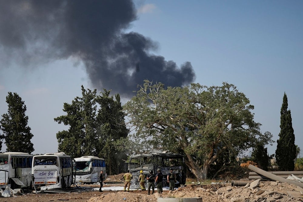 Smoke rises from an oil storage facility after it appeared to have been struck by an Israeli strike on Saturday, in Tehran, Iran, Monday, June 16, 2025. (AP Photo/Vahid Salemi)