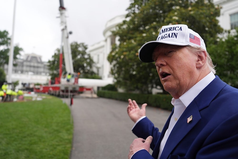 President Donald Trump speaks as a flag pole is installed on the South Lawn of the White House, Wednesday, June 18, 2025, in Washington (AP)