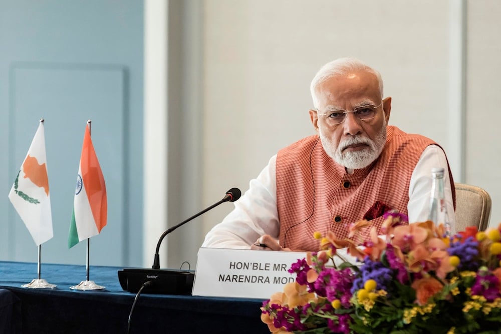 India's Prime Minister Narendra Modi attends a business forum in Limassol, Cyprus, on June 15, 2025. (Iakovos Hatzistavrou/Pool Photo via AP)