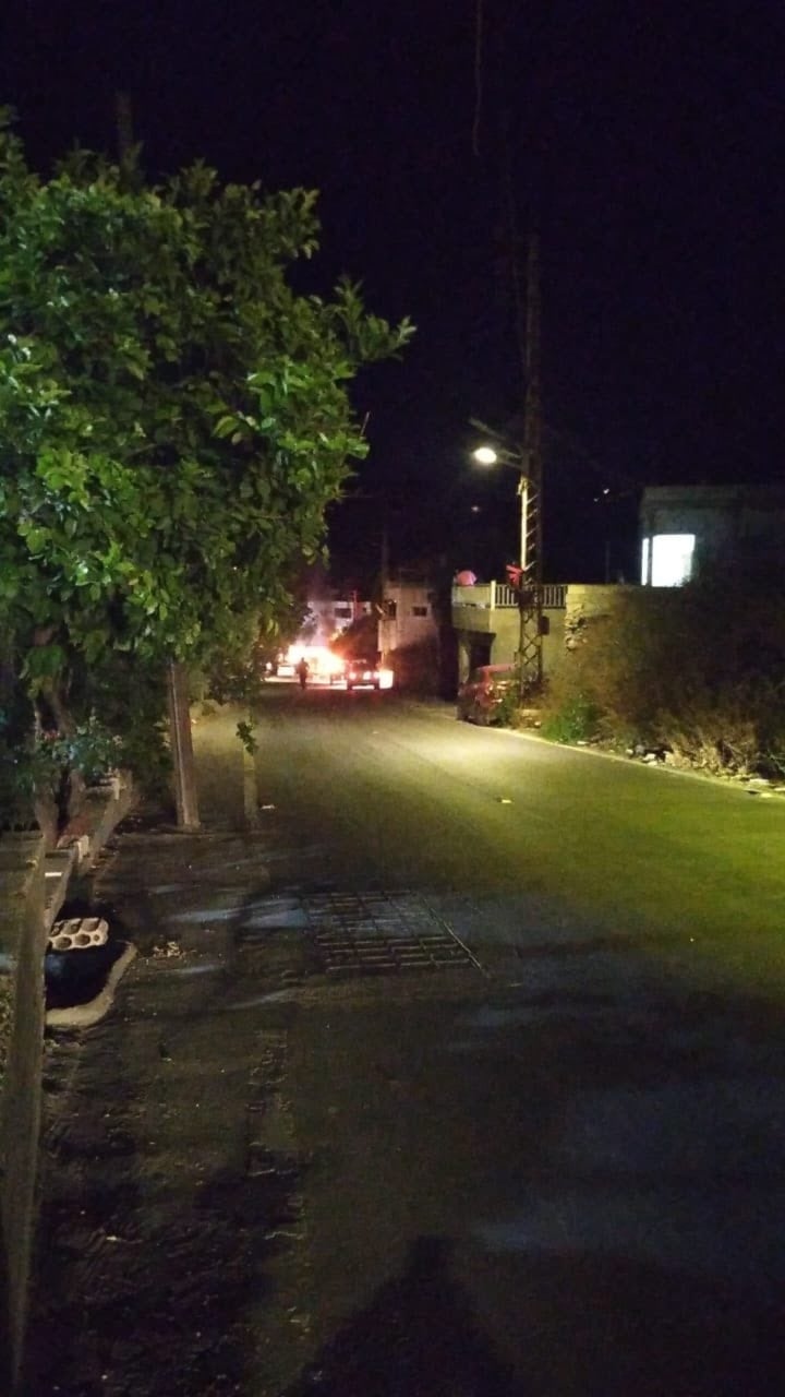 A motorcycle is on fire after an Israeli drone strike targeted it in the southern Lebanese village of Baraachit, June 20, 2025 (Social media)