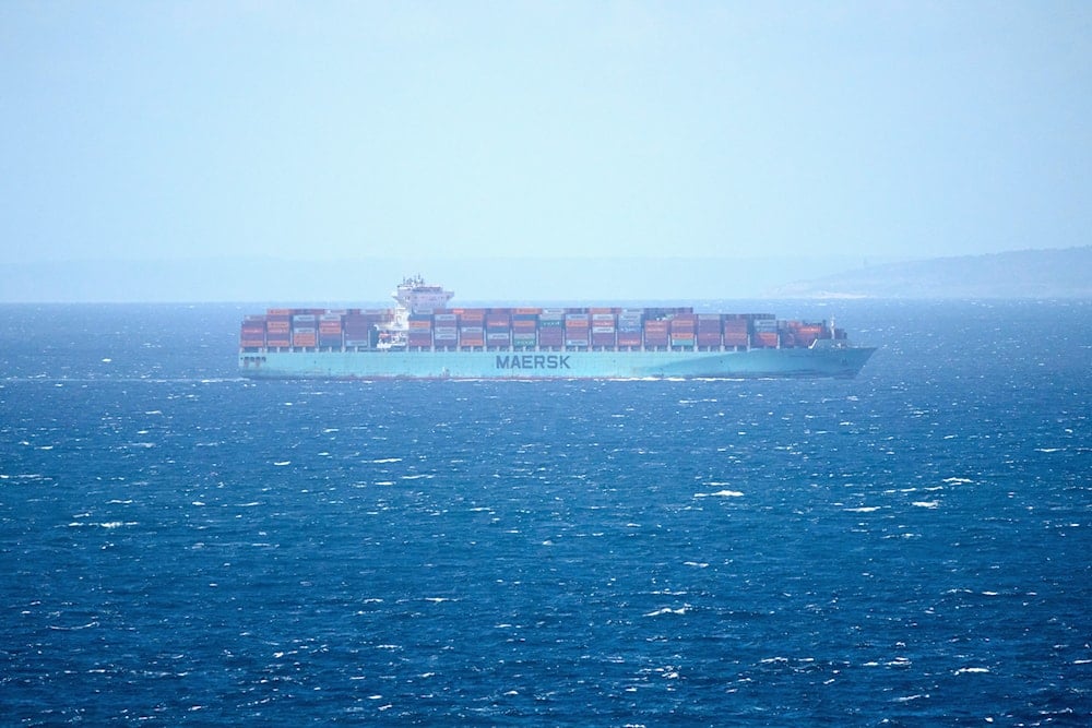 A Maersk cargo ship crosses the Gibraltar Strait near Tangier Med Port, Morocco, Sunday, April 20, 2025 (AP)