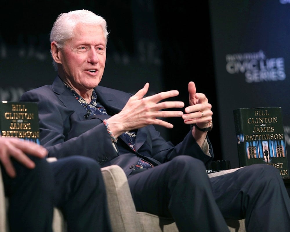 Former President Bill Clinton on stage discussing his book 