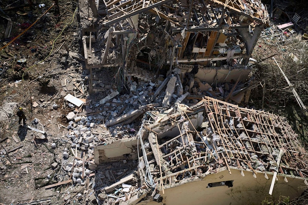 The site of a direct missile strike launched from Iran in Tel Aviv on Sunday, June 22, 2025. (AP)