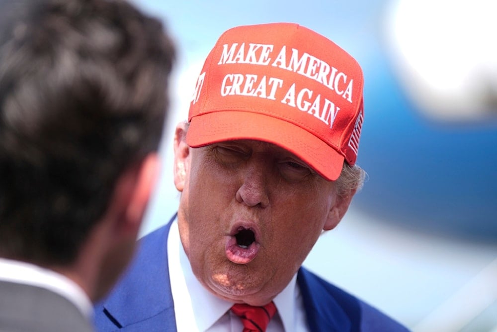 President Donald Trump speaks with reporters upon arriving at Morristown Municipal Airport in Morristown, N.J., Friday, June 20, 2025. (AP Photo/Manuel Balce Ceneta)