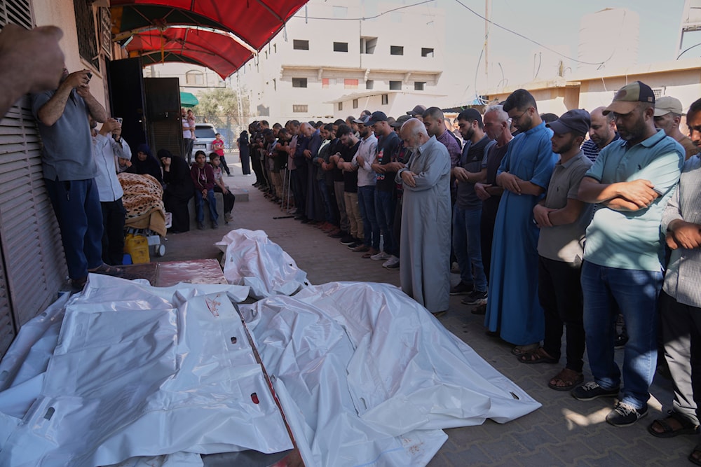 Israeli forces kill, injure dozens in Gaza overnight