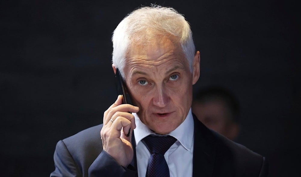 Russian First Deputy Prime Minister Andrei Belousov speaks to the mobile phone before a meeting of the Skolkovo Foundation Board of Trustees in Moscow region, Russia, on Monday, Nov. 13, 2023. (AP)