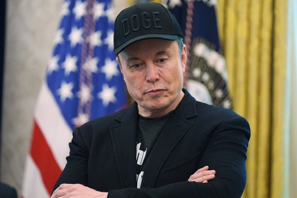 Elon Musk attends a news conference with President Donald Trump in the Oval Office of the White House, Friday, May 30, 2025, in Washington. (AP Photo/Evan Vucci)