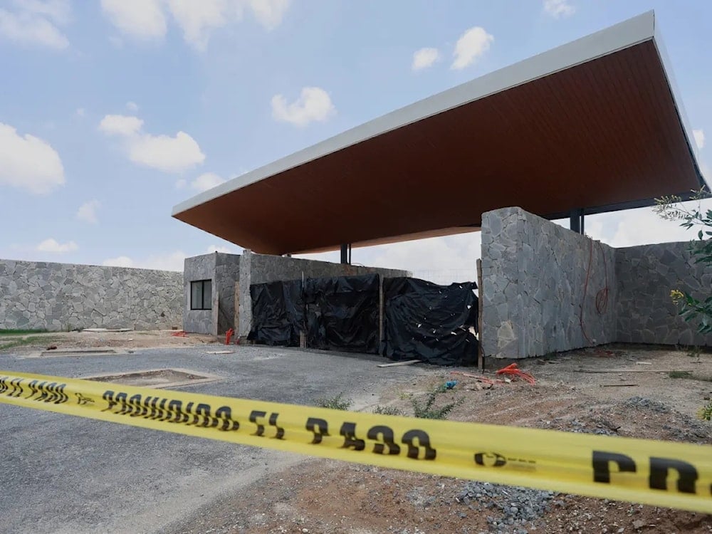 Police tape crosses a construction site where prosecutors say bodies were discovered in a mass grave during excavations for the construction in Nextipac, Zapopan municipality, Jalisco state, Mexico, Friday, June 26, 2025 (AP)