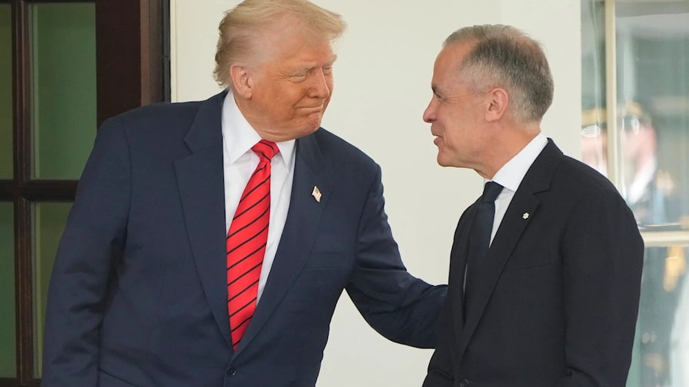 Canadian Prime Minister Mark Carney is greeted by President Donald Trump as he arrives at the West Wing of the White House, Tuesday, May 6, 2025, in Washington (AP)