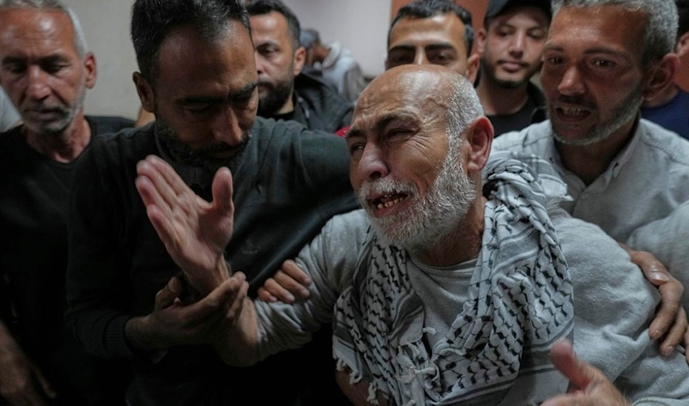 Freed Palestinian prisoner Naeim Al Burai, 66, is welcomed upon arrival at al-Aqsa Hospital in Deir al-Balah, central Gaza Strip, after being released from an Israeli prison, Thursday, April 10, 2025. (AP)