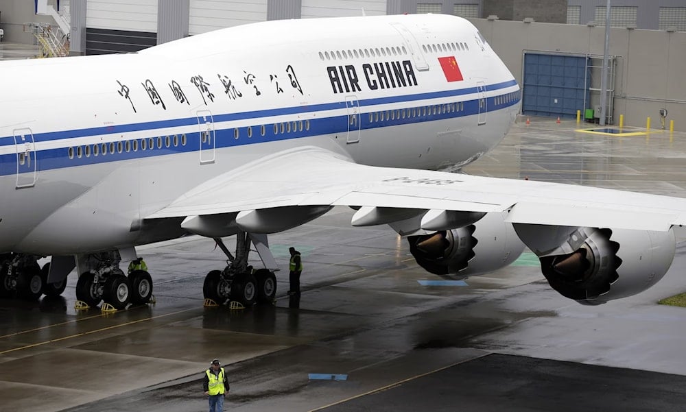 An Air China Boeing 747-8 Intercontinental. Shares in Boeing have been buffeted by worries about the impact of trade tariffs (Ted S Warren/AP)