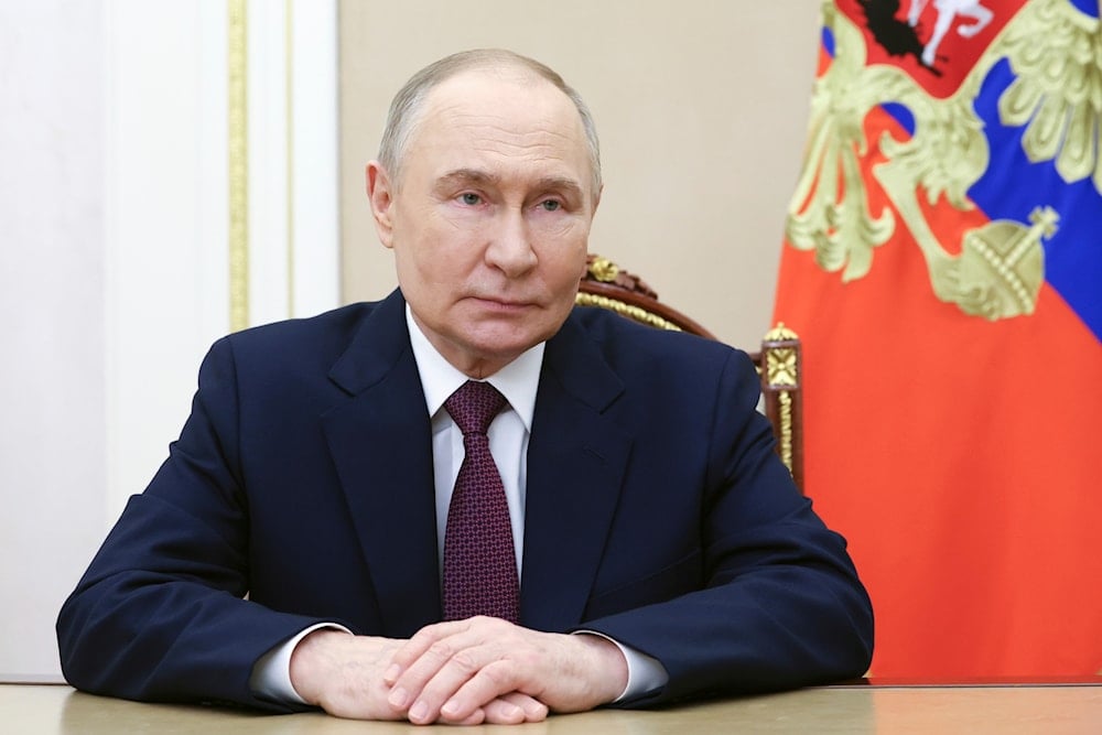 Russian President Vladimir Putin records a video address on the 70th anniversary of the Baikonur Cosmodrome, at the Kremlin in Moscow, Russia, Monday, June 2, 2025. (Gavriil Grigorov, Sputnik, Kremlin Pool Photo via AP)