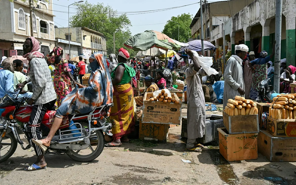 Locals walk across a busy marketplace in N'djamena, Chad in this undated photo (Issouf Sanogo/AFP)