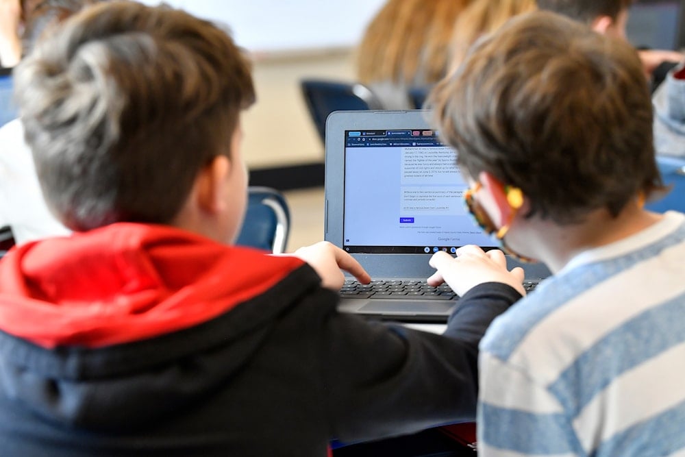 Students work on a laptop computer at Stonewall Elementary in Lexington, Ky., Feb. 6, 2023. (AP)
