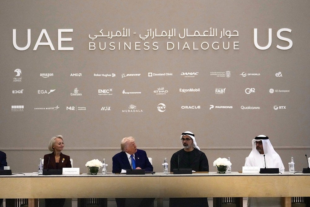 President Donald Trump attends a business meeting and roundtable at Qasr Al Watan, in Abu Dhabi, United Arab Emirates Friday, May 16, 2025 (AP)