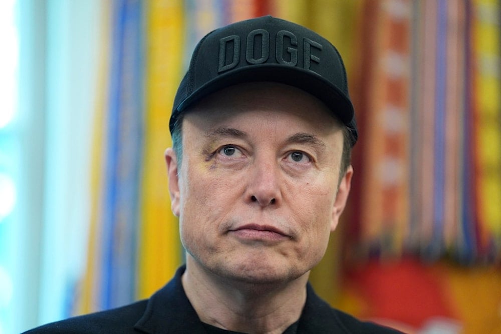 Elon Musk attends a news conference with President Donald Trump in the Oval Office of the White House, Friday, May 30, 2025, in Washington. (AP Photo/Evan Vucci)