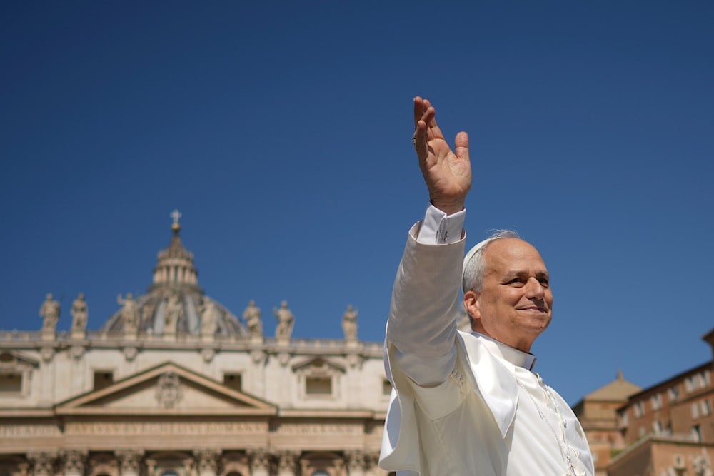 Pope Leo XIV waves as arrives to celebrate a Mass for the Jubilee of New Religious Associations on Pentecost Day in St. Peter's Square at the Vatican, on June 8, 2025. (AP Photo/Andrew Medichini)