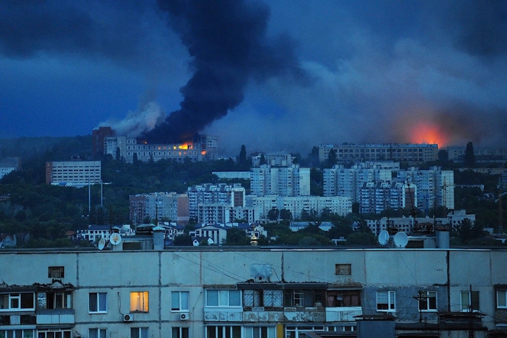 Fire and smoke rise from the site where a Russian missile struck Kharkiv, Ukraine, Saturday, June 7, 2025 (AP)