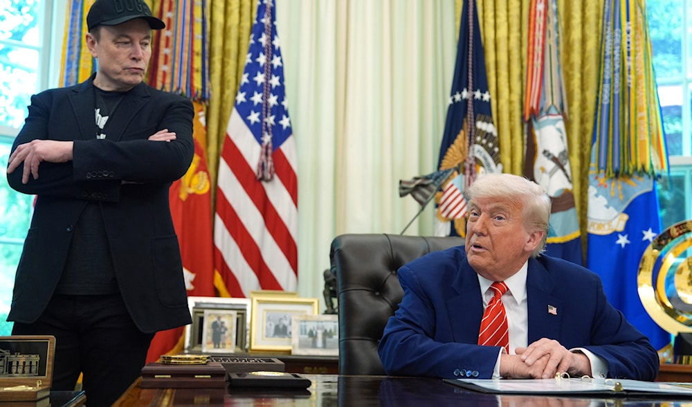 President Donald Trump, right, speaks during a news conference with Elon Musk in the Oval Office of the White House, Friday, May 30, 2025, in Washington. (AP)