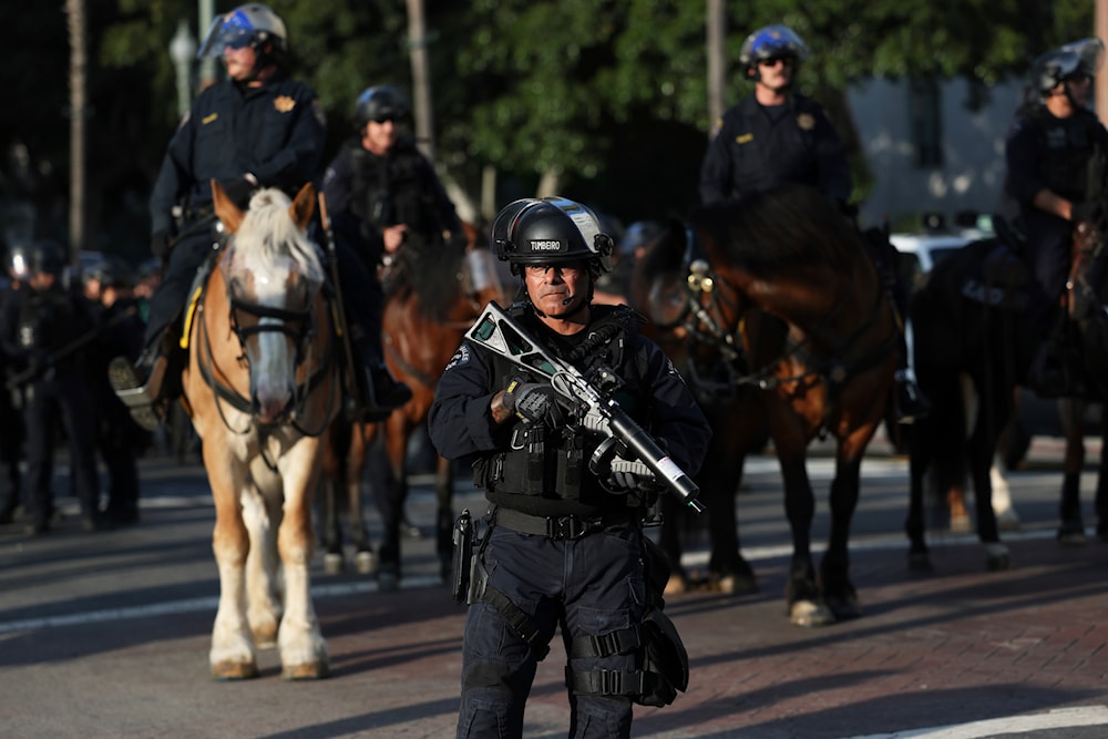 A Los Angeles Metro police officer stands guard during a protest on Wednesday, June 11, 2025, in Los Angeles. (AP )