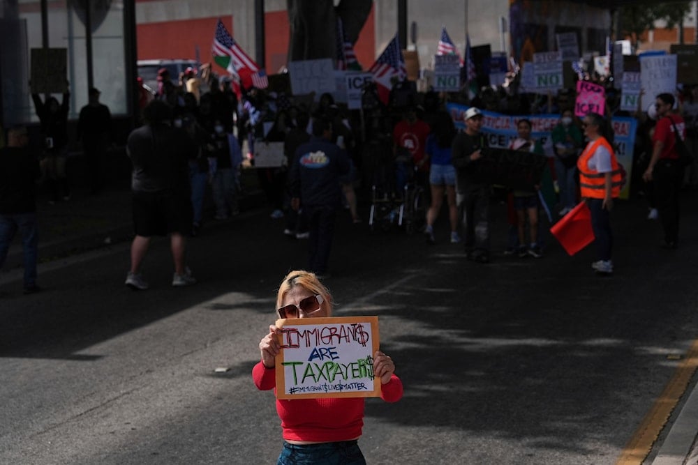 Demonstrators march during a protest in reaction to recent immigration raids on Friday, July 11, 2025, in Oxnard, Calif. (AP)
