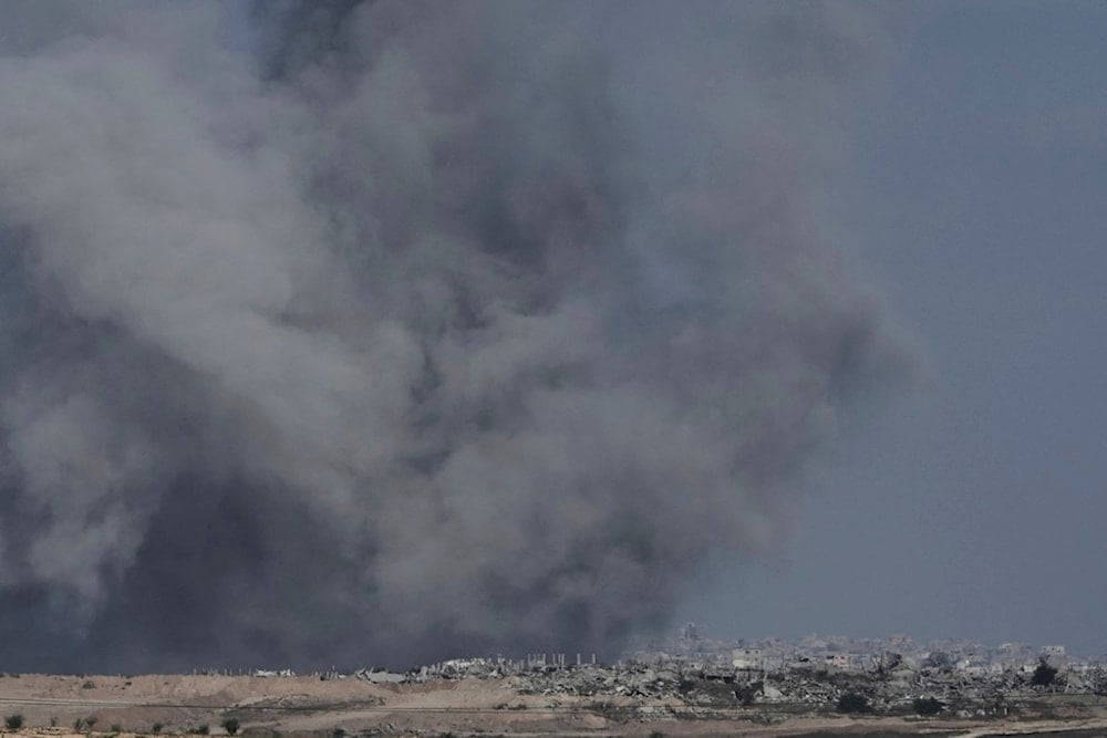 Smoke from Israeli bombardment of the northern Gaza Strip, seen from southern occupied Palestine, Monday, July 14, 2025 (AP)