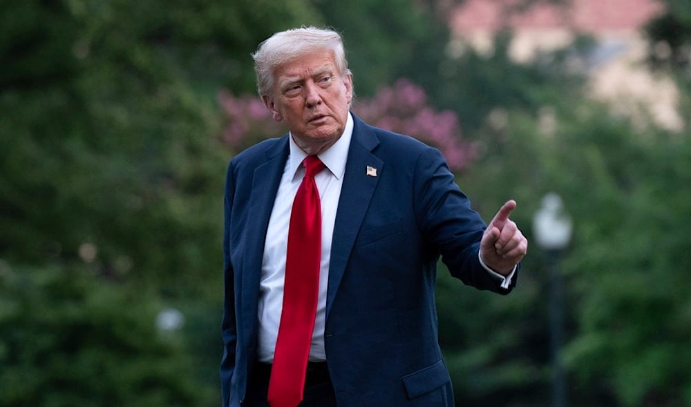 President Donald Trump talks to reporters as he walks on the South Lawn upon arriving at the White House, Sunday, July 13, 2025, in Washington. (AP)