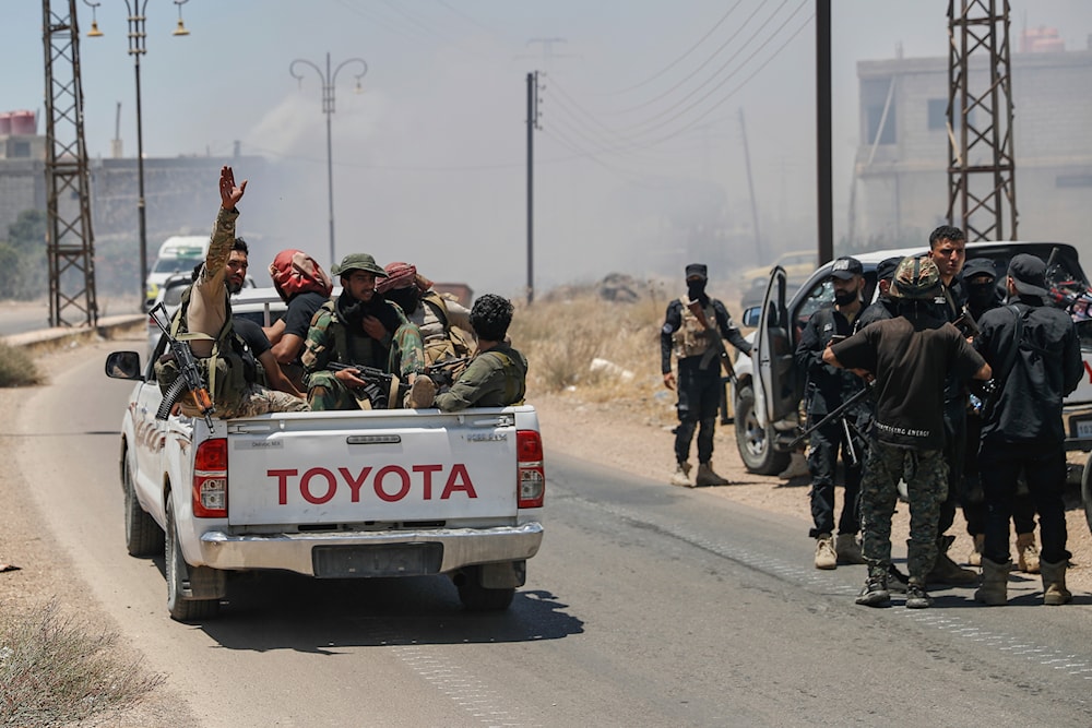Syrian government forces gather at Mazraa village on the outskirts of Sweida city, southern Syria, Tuesday, July 15, 2025.(AP )