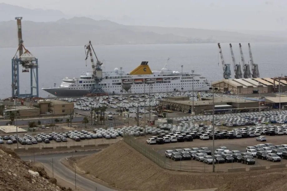 New cars are parked in the port of the southern city of Umm el Rashrash, near the border with Egypt, Occupied Palestine, February 15, 2012 (AFP)