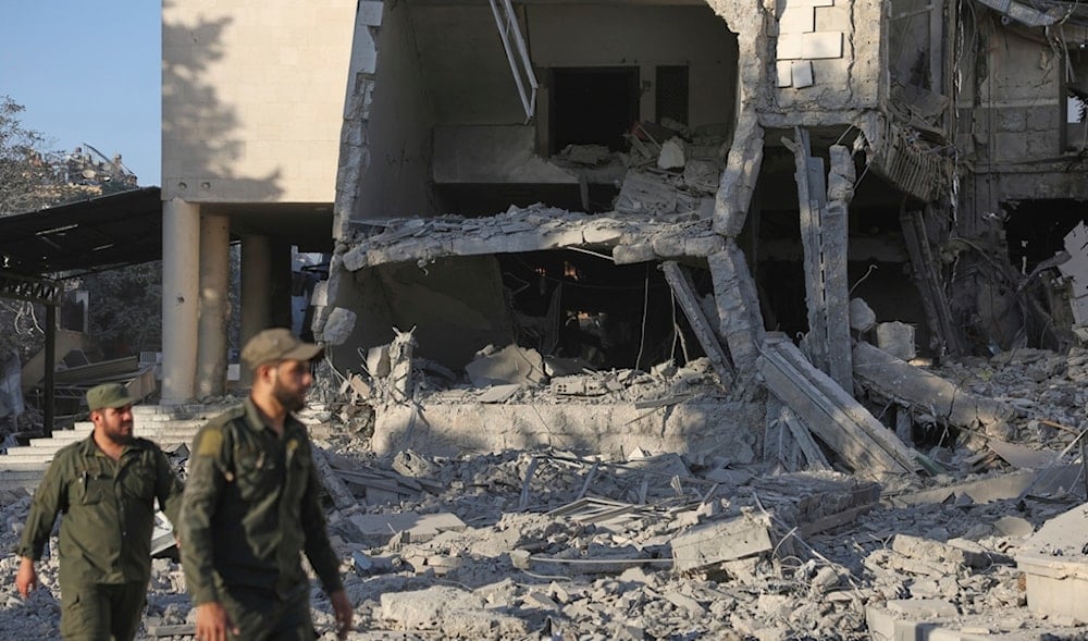 Security forces inspect the damaged Syrian Defense Ministry building hit by several Israeli airstrikes, in Damascus, Syria, Wednesday, July 16, 2025. (AP)