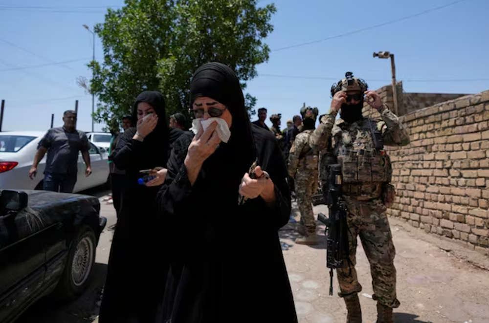Six local officials detained over Iraq deadly mall fire
