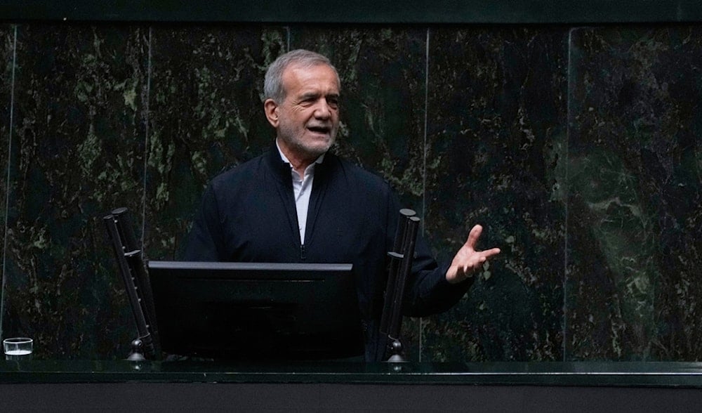 Iranian President Masoud Pezeshkian speaks during a memorial at the parliament in Tehran, Iran, Wednesday, May 21, 2025 (AP)