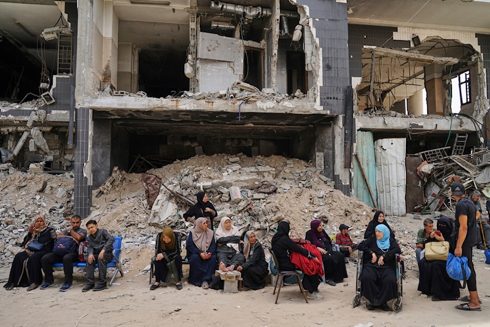Kidney patients sit amid the destruction caused by the Israeli army at al-Shifa Hospital compound in Gaza City on Tuesday, July 1, 2025 after the facility suspended its dialysis unit services due to fuel shortages (AP)