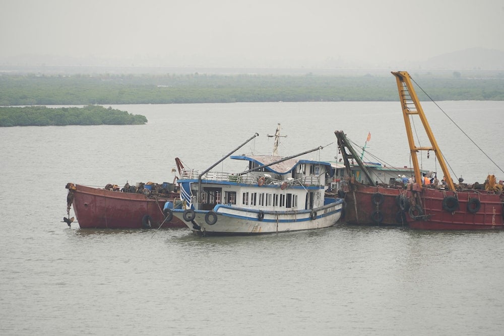 Tourist boat Wonder Sea is towed to a shipyard for investigation after its capsizing, which killed multiple people, in a thunderstorm in Ha Long Bay, Vietnam Sunday, July 20, 2025. (AP Photo/Huy Han)