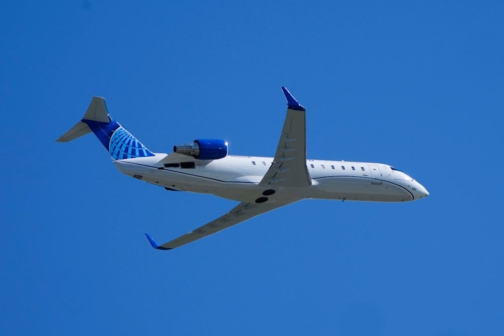 A United Express SkyWest Airlines CRJ-200LR plane departs from Freeland, Mich., May 1, 2024. (AP Photo/Paul Sancya)