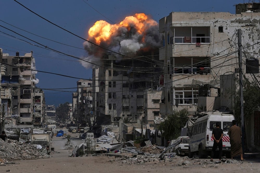 Smoke and flames erupt from an Israeli airstrike in Gaza City, Monday, July 21, 2025 (AP)