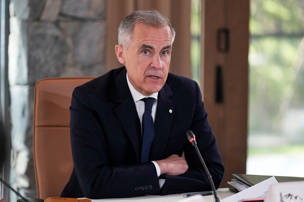 Canada's Prime Minister Mark Carney participates in a session of the G7 Summit, Monday, June 16, 2025, in Kananaskis, Canada. (AP Photo/Mark Schiefelbein)