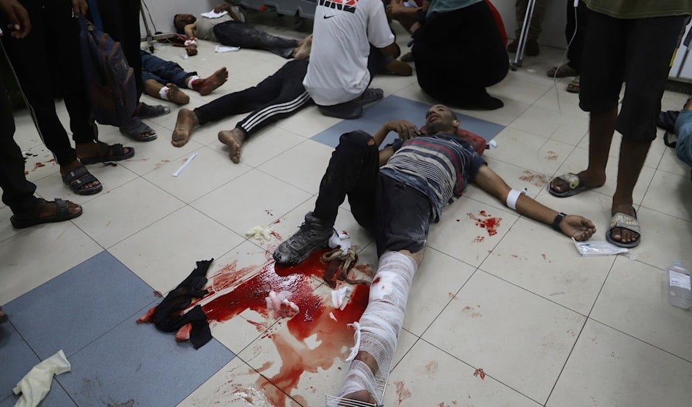 Palestinians are brought to Nasser Hospital after being shot by Israeli forces while gathering to receive bags of flour from aid trucks, in Khan Younis, Gaza Strip, on Thursday, July 24, 2025. (AP)
