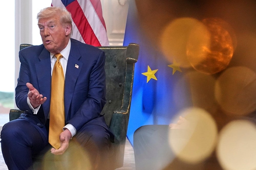 President Donald Trump speaks as he meets European Commission President Ursula von der Leyen at the Trump Turnberry golf course in Turnberry, Scotland, Sunday, July 27, 2025 (AP)
