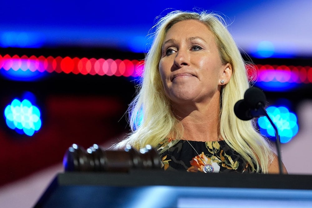 Rep. Marjorie Taylor Greene, R-Ga., does a podium check at the Fiserv Forum before the start of the Republican National Convention, on July 15, 2024, in Milwaukee. (AP Photo/Julia Nikhinson)