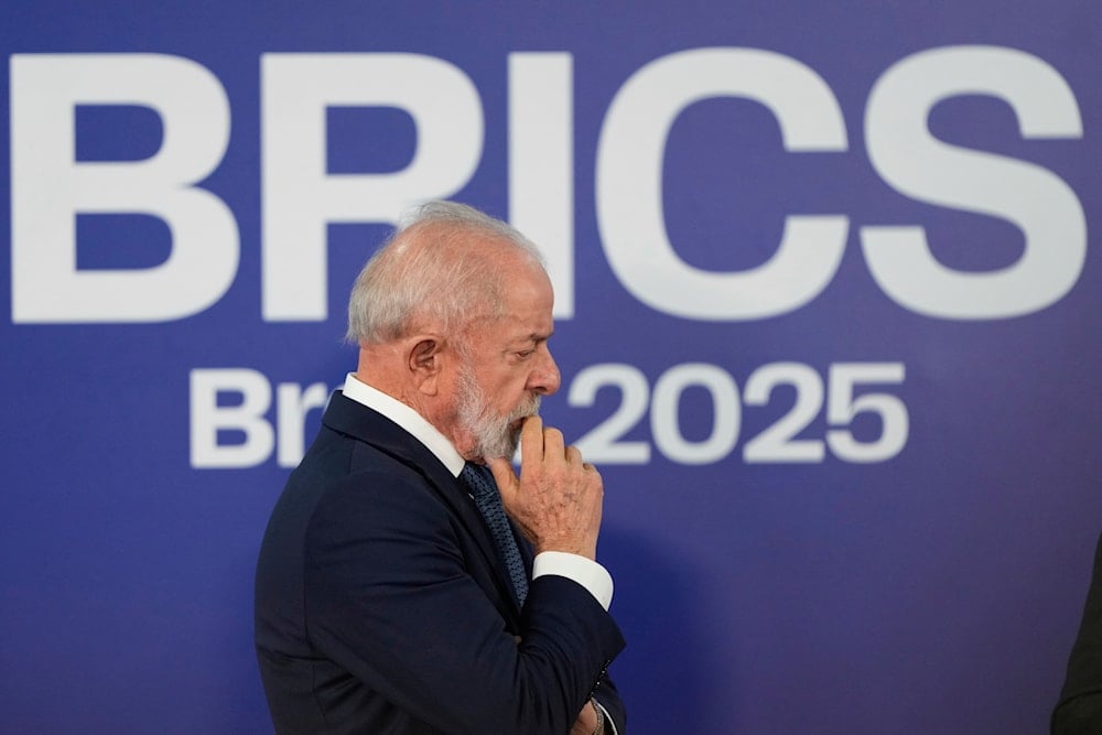 Brazilian President Luiz Inacio Lula da Silva gestures during a press conference at the 17th annual BRICS summit in Rio de Janeiro, on July 7, 2025. (AP Photo/Eraldo Peres)