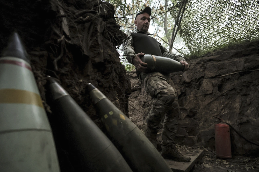 A Ukrainian serviceman prepares to fire a howitzer toward Russian army positions near Chasiv Yar, Donetsk, on June 14, 2025. (AP)