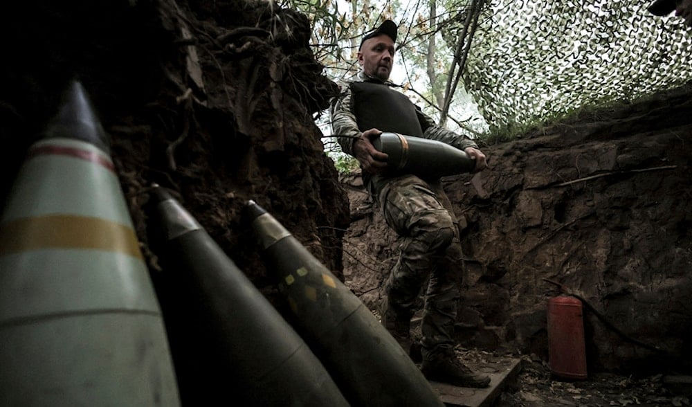 In this photo provided by Ukraine's 24th Mechanized Brigade press service, a serviceman prepares to fire a howitzer toward Russian army positions near Chasiv Yar, Donetsk region, Ukraine, June 14, 2025. (AP)