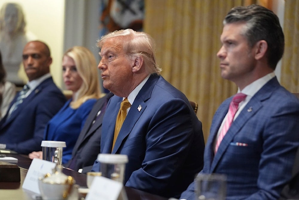 President Donald Trump, center, speaks during a cabinet meeting at the White House, Tuesday, July 8, 2025, in Washington. (AP Photo/Evan Vucci)