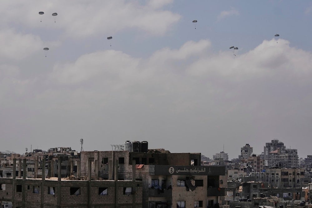 Humanitarian aid is airdropped to Palestinians over Gaza City, northern Gaza Strip, Friday, August 8, 2025 (AP)